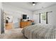 Bedroom with neutral tones, ceiling fan, and dresser, offering a serene and comfortable space at 751 Dusty Pine Way, Myrtle Beach, SC 29588