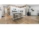 Open concept kitchen featuring granite countertops, stainless steel appliances, and white cabinets at 751 Dusty Pine Way, Myrtle Beach, SC 29588
