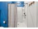 Modern shower featuring a rainfall showerhead, built-in shelving, and sleek fixtures at 751 Dusty Pine Way, Myrtle Beach, SC 29588