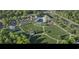 Aerial view of community with walking trails, pool, playground, tennis courts, lush green spaces, and convenient parking at 812 Maltby Alley, Myrtle Beach, SC 29588