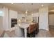 Modern kitchen with white cabinets, a granite island, and stainless steel appliances at 812 Maltby Alley, Myrtle Beach, SC 29588