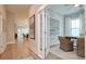 Bright office space featuring a whitewashed accent wall and glass French doors at 812 Maltby Alley, Myrtle Beach, SC 29588