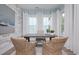 Well-lit office with large windows and elegant wicker chairs for a comfortable workspace at 812 Maltby Alley, Myrtle Beach, SC 29588
