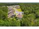 Aerial view of a home nestled among trees, showcasing its location in a peaceful neighborhood at 818 Mourning Dove Dr., Myrtle Beach, SC 29577