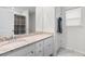 Well-lit bathroom featuring a sink with granite countertop and plenty of cabinet storage space at 818 Mourning Dove Dr., Myrtle Beach, SC 29577