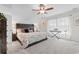 Calm bedroom with a unique headboard, neutral color palette, and soft lighting, perfect for relaxation at 818 Mourning Dove Dr., Myrtle Beach, SC 29577