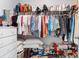 Well-organized walk-in closet with ample storage space for clothing, shoes, handbags and accessories at 818 Mourning Dove Dr., Myrtle Beach, SC 29577