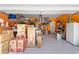 Organized garage featuring ample storage space, shelving, and an epoxy floor for durability at 818 Mourning Dove Dr., Myrtle Beach, SC 29577