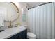 Bathroom featuring updated vanity, gold fixtures, and modern finishes at 824 N Waccamaw Dr. # 204, Murrells Inlet, SC 29576