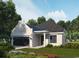Charming one-story home featuring a brick facade, a front-entry two-car garage, and well-maintained landscaping at 8352 Cape Dutch Loop, Myrtle Beach, SC 29572