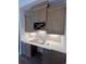 Home office featuring custom cabinets, built-in wine rack, herringbone backsplash, and sleek countertops at 5009 Middleton Dr., Myrtle Beach, SC 29579