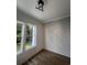 Bright room showcases decorative paneling, wood-look floors and natural light at 5009 Middleton Dr., Myrtle Beach, SC 29579