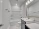 Modern bathroom featuring a shower-tub combination, vanity, and a neutral color scheme at 905 Monmouth Dr., Myrtle Beach, SC 29588