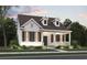 Charming one-story home featuring a welcoming front porch and meticulously landscaped front yard at 905 Monmouth Dr., Myrtle Beach, SC 29588