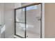 Modern bathroom featuring a glass-enclosed shower with subway tile and sleek hardware at 905 Monmouth Dr., Myrtle Beach, SC 29588