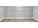 Walk-in closet featuring wire shelving and wood floors at 905 Monmouth Dr., Myrtle Beach, SC 29588