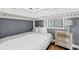 Cozy bedroom with a bunk bed, offering a practical and charming space at 917 S Ocean Blvd. # 103, Surfside Beach, SC 29575
