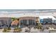 Exterior view of a condo building with parking and a glimpse of the beach nearby, a great location! at 917 S Ocean Blvd. # 103, Surfside Beach, SC 29575