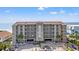 A well-maintained condo complex with parking and lush greenery, perfect for beach living at 917 S Ocean Blvd. # 103, Surfside Beach, SC 29575