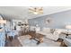 Open-concept living space with kitchen, dining, and living areas, all beautifully decorated at 917 S Ocean Blvd. # 103, Surfside Beach, SC 29575