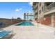 Community pool and sundeck with brick surround at 917 S Ocean Blvd. # 103, Surfside Beach, SC 29575