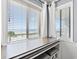 A cozy nook offering serene views of the beach and ocean, perfect for relaxing at 917 S Ocean Blvd. # 103, Surfside Beach, SC 29575