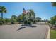 Gated community entrance with American flag and lush landscaping at 950 Henry James Dr., Myrtle Beach, SC 29579