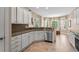 This kitchen features stainless appliances, granite countertops, tile backsplash and bright lighting at 950 Henry James Dr., Myrtle Beach, SC 29579