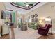 Open-concept living room with hardwood floors, comfortable seating, and bright, colorful design accents at 950 Henry James Dr., Myrtle Beach, SC 29579