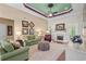 Comfortable living room with a fireplace, plush seating, hardwood floors, and elegant decor at 950 Henry James Dr., Myrtle Beach, SC 29579