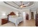 This is the main bedroom with a decorative ceiling and connecting main bathroom at 950 Henry James Dr., Myrtle Beach, SC 29579
