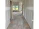 Open concept living space with large windows, and freshly installed drywall at 977 Oak Hollow St., Longs, SC 29568