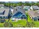 Aerial view of the property showcasing the backyard, hot tub, and surrounding neighborhood at 1012 Mary Read Dr., North Myrtle Beach, SC 29582