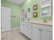 Stylish bathroom featuring double sinks, a neutral countertop, and clean, bright walls at 1012 Mary Read Dr., North Myrtle Beach, SC 29582