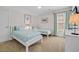 Bright bedroom with twin beds, soft lighting, and neutral walls at 1012 Mary Read Dr., North Myrtle Beach, SC 29582