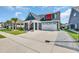 Beautiful home features a two-car garage, inviting front porch, landscaped front lawn, and convenient driveway at 1012 Mary Read Dr., North Myrtle Beach, SC 29582