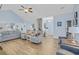 Spacious open concept living room with hardwood floors, plenty of seating, and lots of natural light at 1012 Mary Read Dr., North Myrtle Beach, SC 29582