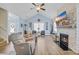 Relaxing living room features a fireplace, comfortable seating, and plenty of natural light, perfect for unwinding at 1012 Mary Read Dr., North Myrtle Beach, SC 29582