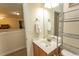 Upstairs bathroom showcasing vanity with sink, mirror, and towel rack at 1028 Fairway Ln. # 71, Conway, SC 29526