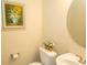 Bright and clean powder room with floral accents and traditional fixtures at 1028 Fairway Ln. # 71, Conway, SC 29526