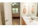 Bathroom vanity with a view of a bedroom that has natural light coming through the window at 1028 Fairway Ln. # 71, Conway, SC 29526