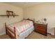 Cozy bedroom featuring a quilted bedspread, natural light, and stylish decor at 1028 Fairway Ln. # 71, Conway, SC 29526