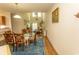 Bright dining room with soaring ceilings that leads to a sun-drenched living area at 1028 Fairway Ln. # 71, Conway, SC 29526