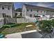 Wide backyard with white fence, grass and playground equipment at 1029 Tee Shot Dr. # 1029, Conway, SC 29526