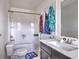 Cozy bathroom featuring a tub, toilet and single sink vanity at 1029 Tee Shot Dr. # 1029, Conway, SC 29526