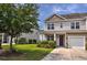 Exterior elevation of a townhome with an attached garage at 1029 Tee Shot Dr. # 1029, Conway, SC 29526
