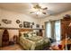 Comfortable bedroom with ceiling fan and private outdoor access at 1058 Sea Mountain Hwy. # 3-201, North Myrtle Beach, SC 29582
