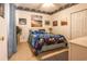 Cozy bedroom with carpet, marine-themed decor, fan and a large closet at 1058 Sea Mountain Hwy. # 3-201, North Myrtle Beach, SC 29582