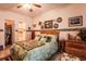 Inviting bedroom with ceiling fan and decorative nautical details at 1058 Sea Mountain Hwy. # 3-201, North Myrtle Beach, SC 29582