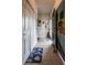 Tiled entryway with neutral walls, sliding door closet, and a decorative palm tree curtain at 1058 Sea Mountain Hwy. # 3-201, North Myrtle Beach, SC 29582